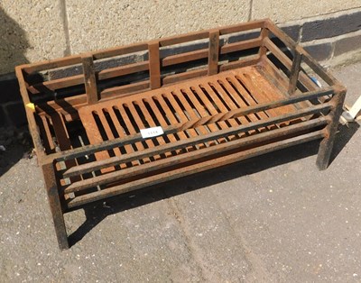 Lot 1114 - An iron fire basket, 24cm high, 61cm wide,...