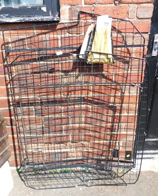 Lot 1182 - A metal dog guard.