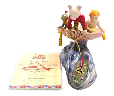 Lot 673 - A Royal Doulton figure group Rupert Rides Home,...