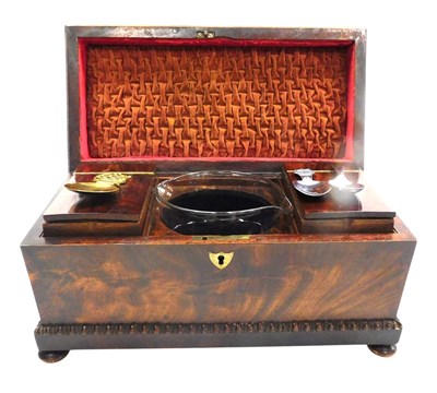 Lot 550 - A Regency mahogany tea caddy of sarcophagus...