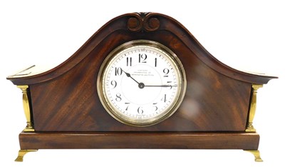 Lot 656 - An early 20thC mahogany cased mantel clock,...