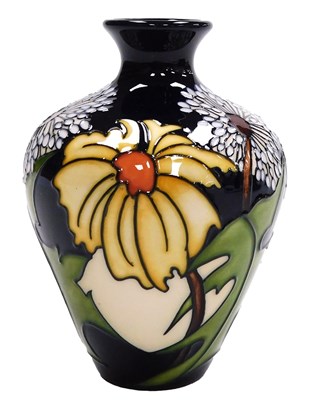 Lot 662 - A Moorcroft pottery Daisy May pattern vase,...