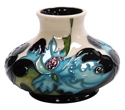 Lot 672 - A Moorcroft pottery Sea Holly pattern vase,...