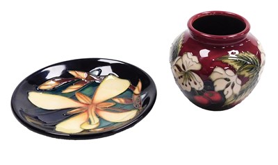 Lot 674 - A Moorcroft pottery Cherry pattern vase, circa...