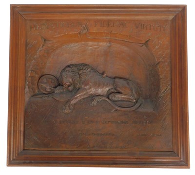 Lot 17 - A 19thC carved wooden panel depicting The Lion...