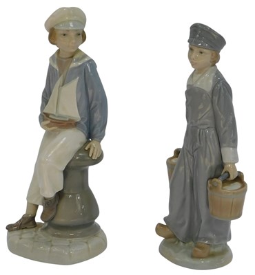 Lot 203 - Two Lladro porcelain figures, modelled as a...