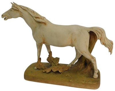 Lot 212 - A Royal Dux matte porcelain figure modelled as...