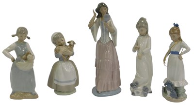 Lot 221 - Five Nao porcelain figures, modelled as a lady...