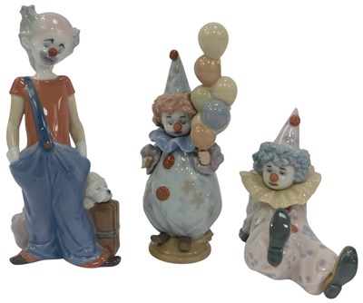 Lot 225 - Three Lladro porcelain clown figures, modelled...
