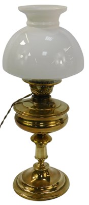 Lot 240 - An early 20thC brass oil lamp, with a milk...