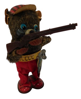 Lot 245 - A Japanese wind-up tinplate toy, modelled as a...