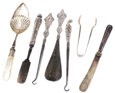 Lot 868 - An Edward VII silver handled shoe horn,...