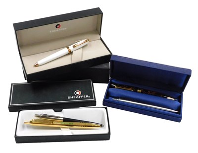 Lot 871 - A Shaeffer white ballpoint pen, cased,...