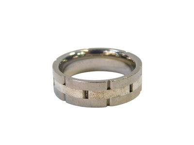 Lot 144 - A titanium gentleman's band, of brick design,...