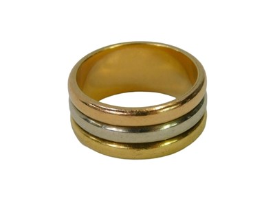 Lot 35 - A tricolour band, rose, white and yellow metal,...
