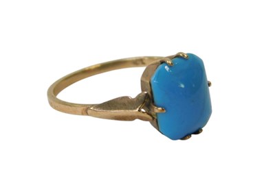 Lot 40 - A turquoise dress ring, claw set, yellow metal,...