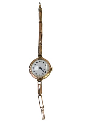 Lot 337 - An early 20thC lady's wristwatch, the white...
