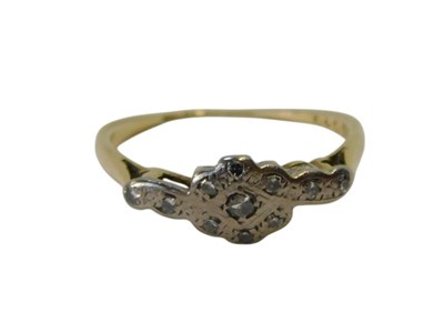 Lot 340 - A diamond illusion set ring, yellow and white...
