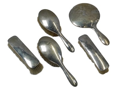 Lot 33 - A George V silver mounted dressing table set,...