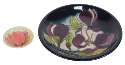 Lot 371 - A Moorcroft pottery plate, decorated in the...