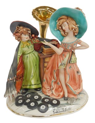 Lot 379 - A Capodimonte figure group modelled as In...