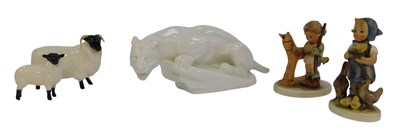 Lot 394 - A Royal Doulton white glaze figure modelled as...
