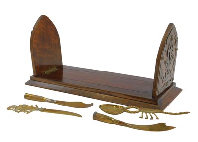 Lot 395 - A Victorian oak extending book slide, with...
