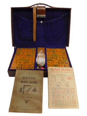 Lot 399 - A leather cased Mahjong set, bearing label...