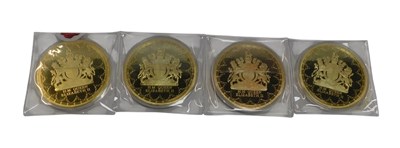 Lot 166 - Four gold plated jumbo commemorative coins, to...