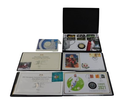 Lot 197 - A group of silver proof coins, comprising 2021...