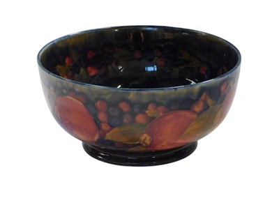 Lot 422 - A William Moorcroft pottery Pomegranate...