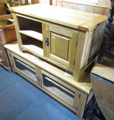 Lot 1006 - Two light oak units, one with two glazed doors...