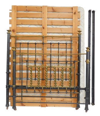 Lot 695 - A Victorian metal and brass double bed,...