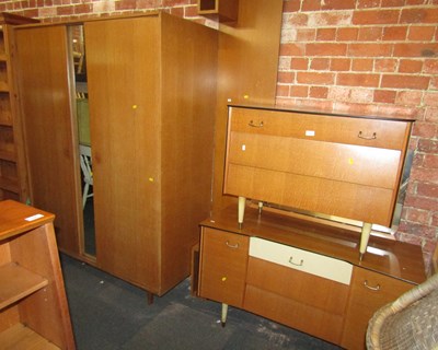 Lot 1032 - An oak bedroom suite, consisting of a three...