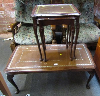 Lot 1038 - A mahogany glass and gilt leather topped...