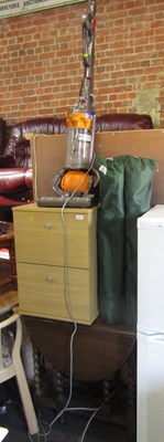 Lot 1047 - A Dyson DC25 vacuum cleaner, a small melamine...