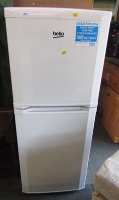 Lot 1048 - A Beko upright fridge freezer.