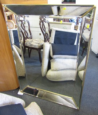 Lot 1051 - A large rectangular bevelled frame mirror,...