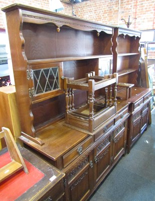 Lot 1059 - An Old Charm style dresser, with two leaded...