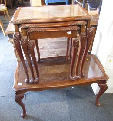 Lot 1064 - A glass topped rectangular walnut coffee table,...
