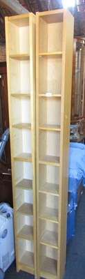 Lot 1068 - Two freestanding adjustable bookcases or CD...