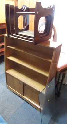 Lot 1081 - A nest of three tables, and a light oak finish...
