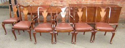Lot 1089 - An extending mahogany and line inlaid dining...