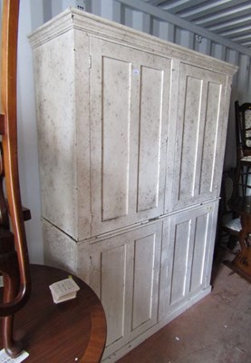 Lot 1090 - A white painted pine cupboard.