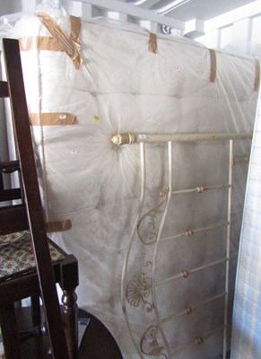 Lot 1093 - A modern longsize bed, with metal headboard,...