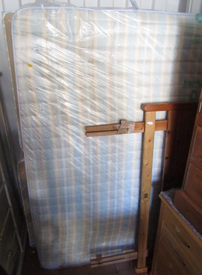 Lot 1094 - A modern double bed, with a wooden headboard,...