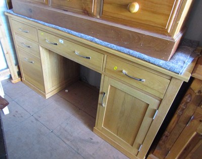 Lot 1096 - A modern twin light oak pedestal kneehole desk,...