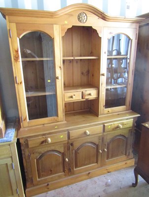 Lot 1097 - A pine display/dresser, with two glazed doors...