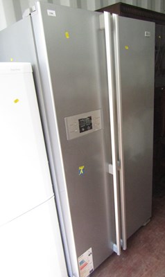 Lot 1100 - An LG American style fridge freezer, with...