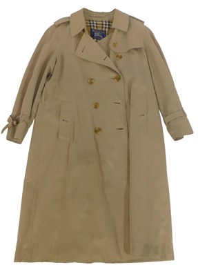 Lot 455 - A Burberrys beige Mackintosh, size unknown,...